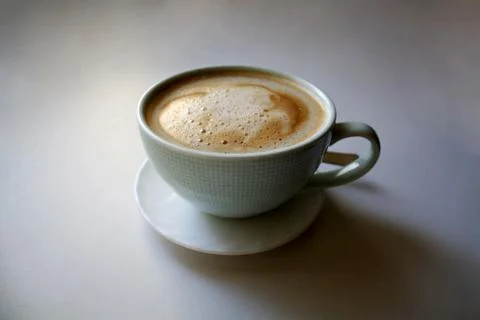 Light blue cup with coffee Stock-Fotos