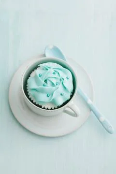 Light blue cupcake Stock Photos
