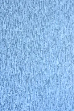 Light blue embossed texture closeup wavy surface Stock Photos