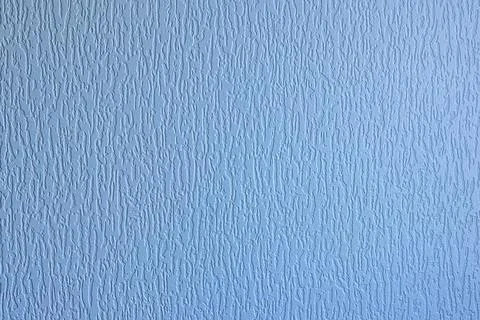 Light blue embossed texture closeup wavy surface Stock Photos