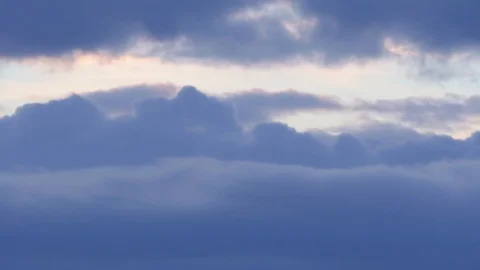 Light blue fluffy puffy clouds that roll beautifully across the heaven Timelapse Stock Footage 106015257