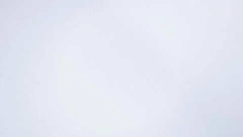 Light blue grainy texture seamless loop motion background Stock Footage 343628043