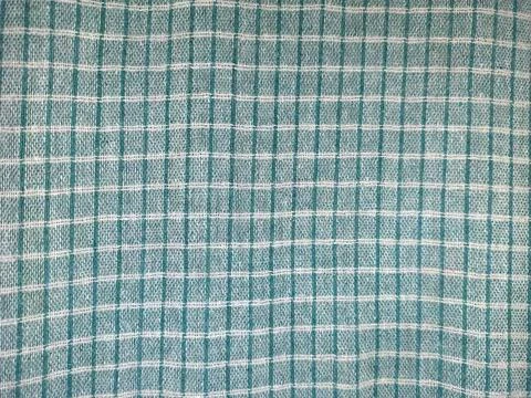 Light Blue Grid Pattern Cotton Cloth Background 库存照片