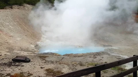 Light blue hot spring, bubbling in Yellowstone national park, in Wyoming, U.. Stock Footage 71780006