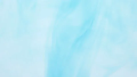 Light blue ink is spreading in clear water. Abstract background Stock Footage 201331057