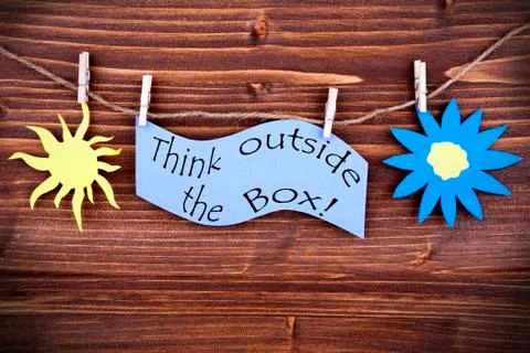 Light Blue Lable Saying Think Outside The Box Stock Photos