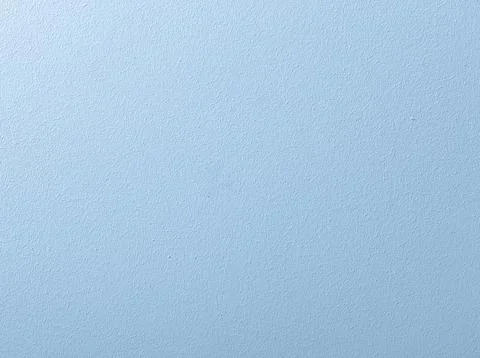 Light blue painted wall texture created with paint roller. Subtle rough sur.. Stock Photos