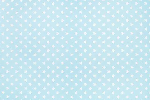 A light blue paper background with white stars Stock Photos