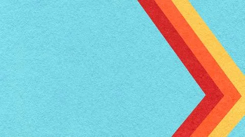 Light blue paper texture background with red, orange yellow, chevron stripe.. Stock Photos