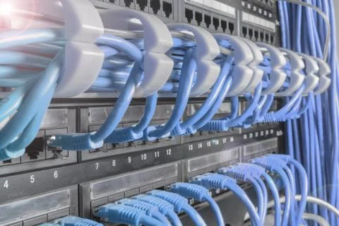 Light blue patch cord internet cables connected Stock Photos