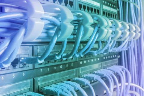 Light blue patch cord internet cables connected Stock Photos