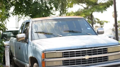 Light blue pickup truck parked Stock Footage