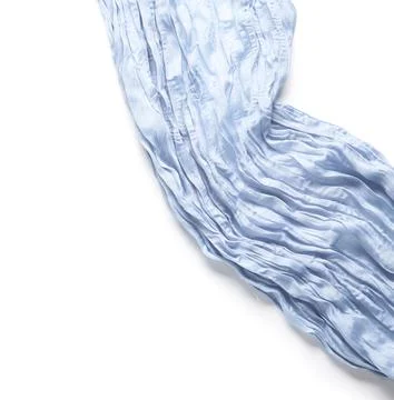 Light blue pleated fabric texture with soft folds and wrinkles textile backgr Stock Photos