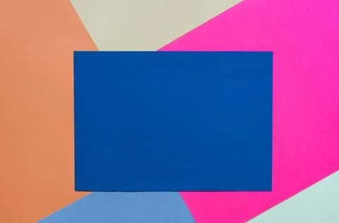 Light blue sheet of paper with place for your text on a colored background. Stock Photos