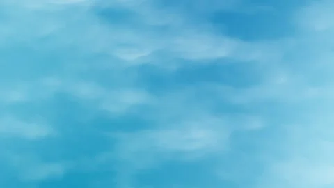 Light blue sky with blurred clouds Video stock 333578423