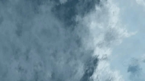 Light blue sky with clouds background 스톡 동영상 310946934