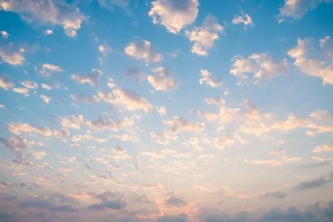 Light blue sky with clouds. Summer sky. Stock Photos