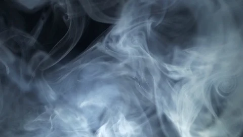 Light blue smoke on black background. 스톡 동영상 114584770