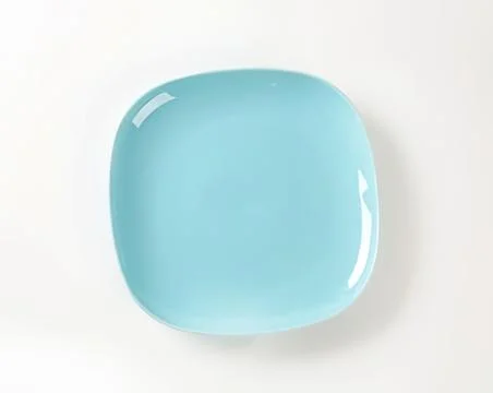 Light blue square ceramic plate Stock Photos