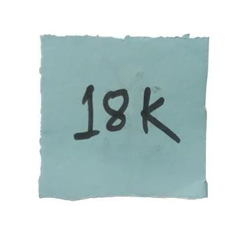 Light blue sticky note with 18k text handwritten in black marker Stock Photos