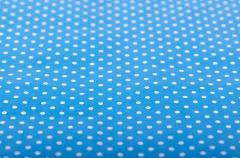 Light blue textile dot pattern seamless background . Stock Photos