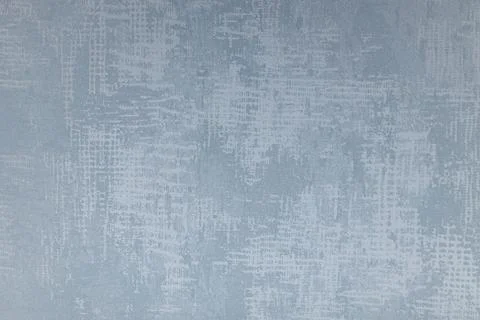 Light blue textured wallpaper background with distressed pattern Stock Photos