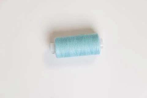 Light blue thread spool Stock Photos