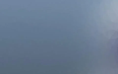 Light BLUE vector shining triangular pattern. Stockillustratie