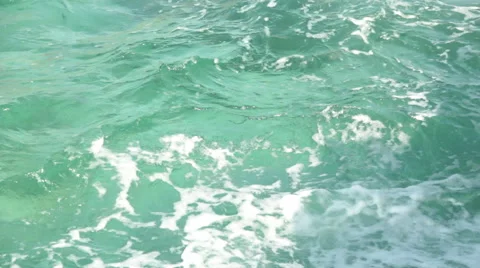 Light blue water with small waves, loopable background (FULL HD) Video stock 40950470