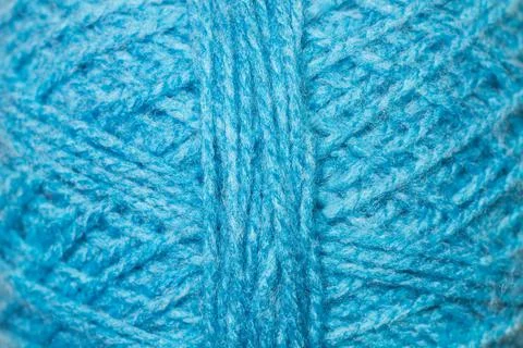 Light blue wool ball in a close up view Foto stock