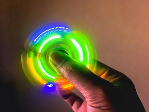 Light blurry spinning on hand Foto stock