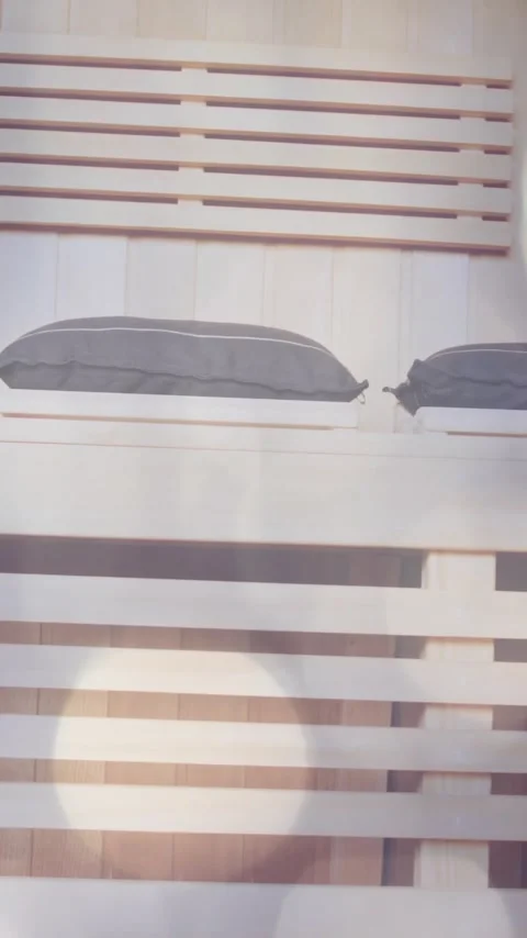 Light bokeh animation over modern wooden interior with decorative pillows Stock Footage 323781067