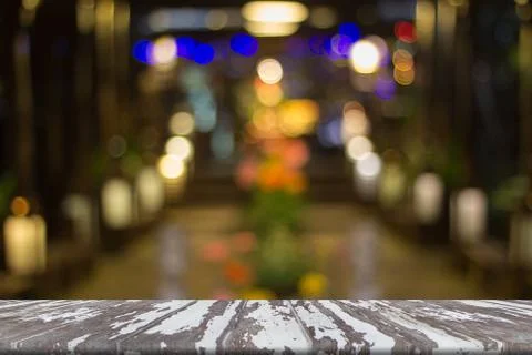 Light bokeh background on old table Stock Photos