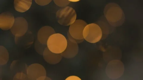 Light bokeh from a Christmas tree. Blurred fairy Christmas lights. Vidéo 212367483