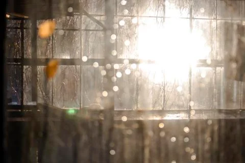 Light with bokeh effect passes through the flat glass Stock Photos