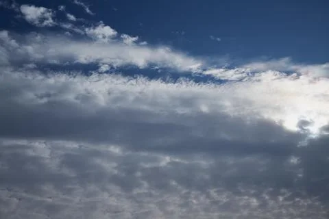 Light breaks through clouds in the sky, light inside the cloud Stock Photos