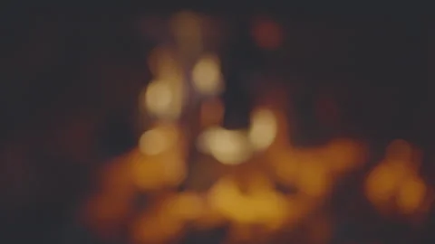 Light from bright yellow bonfire on dark blurred background. Stock Footage 249701812