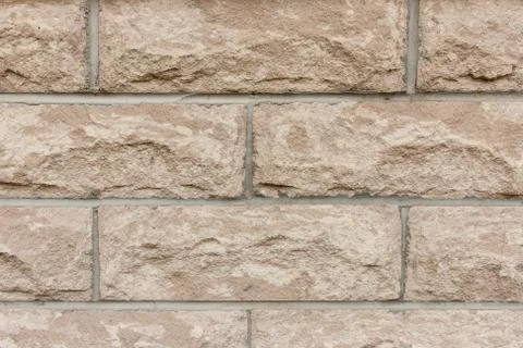 Light brown brick wall background. Stock Photos
