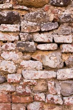 Light Brown brick wall background texture, old bricks rusty wall of ancient c Stock Photos