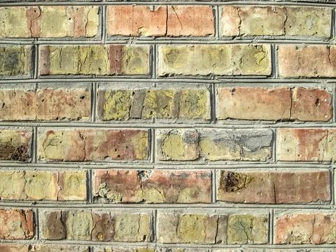 Light brown brickwork. Background with building stones. An old private house. 스톡 사진