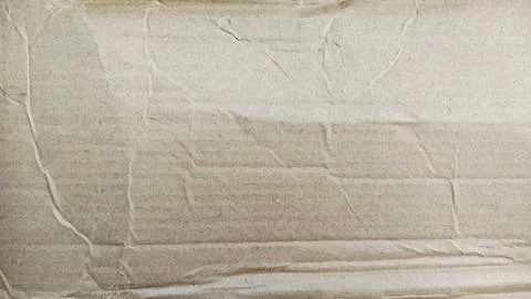 Light brown cardboard texture background with organic fiber patterns. Stockfoto's