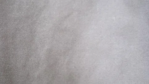 Light brown cloth texture as a background Stock Photos
