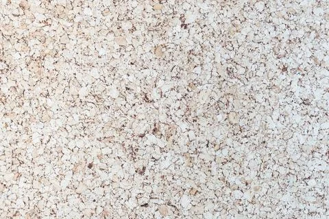 Light Brown corkboard texture with an empty pinboard surface provides a ver.. Фото