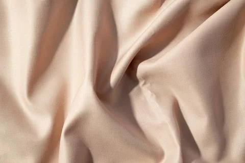Light brown fabric background texture. Stock Photos