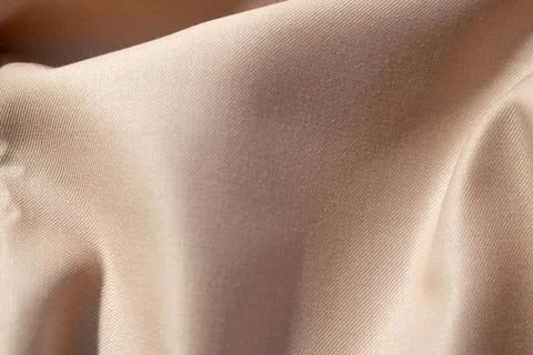 Light brown fabric background texture. Stock Photos