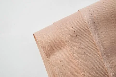 Light brown fabric background texture. Stock Photos