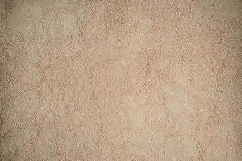Light brown leather texture surface. Close-up of natural grain cow leather Li Stock Photos