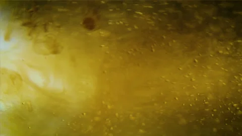 Light brown liquid inject into water,and fills screen Stock Footage 162044525