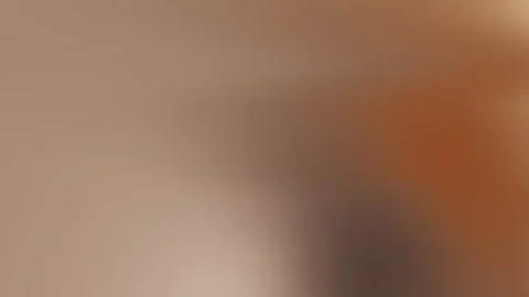 Light brown to orange gradient background. Vidéo 286796400