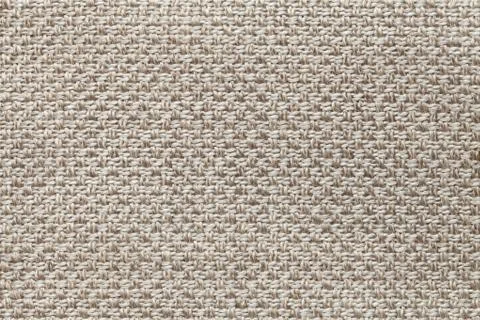 Light brown textile background with checkered pattern, closeup. Structure of  Stock Photos